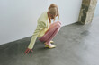© Serge Filimonov/Stocksy - Fashion portrait woman in pastel color outfit