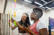 © VICTOR TORRES/Stocksy - Collaborative brainstorming session with sticky notes