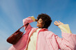 © BONNINSTUDIO/Stocksy - Smiling woman enjoying a sunny day outdoor