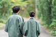 © buritora - The backs of couples or married couples in yukata (traditional Japanese summer kimonos) on a hot spring trip.