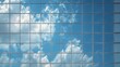 © grey - Glass panels reflecting sky repeating pattern