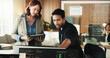 © peopleimages.com - Tablet, programmer and computer with business people in office for web developer, research or feedback. Code review, software engineer and database with employees in tech startup for it collaboration