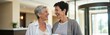 © miss irine - Two smiling senior women share coffee in a modern hotel lobby. Mature couple enjoys vacation time together, holding cups, looking at each other with affection and warmth.
