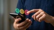 © Masque - Person using a mobile phone to select an emotion face rating for customer satisfaction feedback.