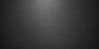 © fart and poop - A dark brushed metal texture background with a black leather pattern on a silver metallic steel surface creating a gray industrial material wallpaper design