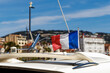 © 9parusnikov - French flag waving on a white yacht in Cannes