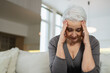 © Юлия Завалишина - Sad tired ill sick lonely disappointed older senior woman sitting at home alone. Unhappy mature grandmother experiencing grief relative death bad news. Stressed elder lady suffering from loneliness