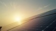 © Ali - Sunlight glints off solar panels on a clear day, symbolizing clean energy and sustainability.