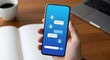© Tenga - Person using smartphone with messaging app showing chat bubbles and social