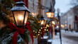 © photo for everything - Close up of a classic outdoor lantern adorned with festive evergreen branches and a bright red ribbon in a charming snowy winter street scene