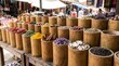 © Abu - Spices and herbs in bamboo containers at outdoor market