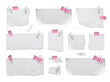 © Glenn - Assorted blank ripped white paper pieces, secured with pink adhesive tape and metallic paper clips.