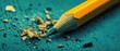 © Opaopi - Sharpened pencil and wood shavings on teal surface close up macro photography