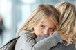 © Ulivers - Sad young girl hugging her mother in a car, ideal for family support and child emotional wellbeing content