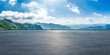 © ABCDstock - Empty asphalt road and scenic mountain landscape under a blue sky with white clouds, Hunan, China
