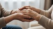 © skayy - Close-up of two people holding hands, offering comfort and support.