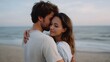 © Bussakon - A couple sharing an intimate moment in an embrace on the beach during the soft light of dusk
