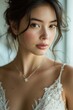 © Rawpixel.com - East Asian couple necklace jewelry diamond.