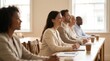 © AspctStyle - Diverse business professionals attending corporate seminar or training workshop. Professional development and employee education for career growth.