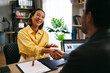 © djile - Business partners shaking hands after successful agreement