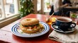 © Viacheslav - Breakfast With a Bagel and a Black Tea on a Striped Plate on Red Table, food scene, commercial stock appeal, inviting presentation, balanced composition, realistic lighting, crisp focus, refined