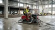 © Viacheslav - Concrete floor trowel machine smoothing surface, infrastructure concept, commercial stock appeal, precise technical detail, balanced composition, realistic lighting, crisp focus, refined atmosphere,