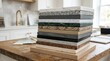© Viacheslav - Stacked kitchen countertop samples showing diverse color shades, interior renovation and material selection concept for home design, architecture and remodeling marketing, practical layered display