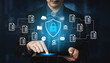 © InfiniteFlow - Businessman Using Tablet for Cybersecurity Management with Digital Lock and Data Protection Icons in Futuristic Environment Ledger.