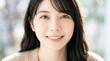 © AiPhoto - 20代女性が明るい室内でリラックスして微笑むポートレート