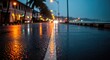 © joharia - Wet Road Reflecting City Lights at Night After Rain.