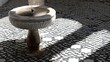 © Kura - courtyard. Moonlit Arabic courtyard with geometric tiles and shadowed fountain. real-estate listings, architecture portfolios, designed for real-estate listing and luxury residence showcases.