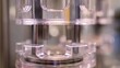 © Goh - Thin plastic film being extruded through circular die in a manufacturing process