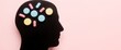 © Giuseppe Cammino - Capsules create clean brain silhouette on pastel background, mental health