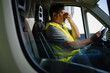 © Cristina Garcia - Mature man covering eyes experiencing stress in truck