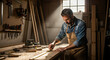© ali - A skilled carpenter in his workshop, focused on meticulously measuring wood for a new project, bathed in natural light