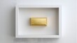 © Gendar SINURO - Top View of Single Shiny Gold Bar in White Frame