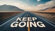 © Soemsuk - Open Road with Motivational Text: Keep Going for Adventure Ahead