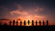 © Farid - Silhouette of Diverse Children Holding Hands Against a Vibrant Sunset Sky.
