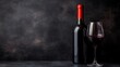 © Sumet - Elegant red wine bottle with glass on dark textured background, showcasing rich color and sophistication, perfect for culinary themes, celebrations, and fine dining