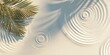 © Syawal - Palm Frond Shadows and Water Ripples on a Textured Surface.