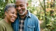 © Eve - Portrait of happy senior african american couple embracing in nature, elderly man and woman smiling together outdoors, diversity in aging and retirement lifestyle, love and bond