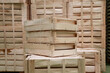 © Vincenzo Rampolla - Stack of empty wooden crates in a warehouse. Professional agricultural packaging for fruit and vegetable transport.