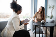 © Zoran Jesic - Businesswomen discussing during consultation at office