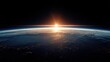 © hariyanti - A breathtaking view of Earth from space showcases a vibrant sunrise illuminating the planet's curvature and the twinkling lights of cities below.
