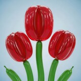 A vibrant sculpture of three red tulips made from shiny glass or plastic