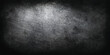 © Ghost Rider - Dark gritty metal texture with distressed surface and vignette lighting background distressed scratched industrial weathered metallic abstract vignette charcoal material backdrop dramatic