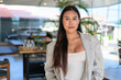 © Ranta Images - Asian woman from Thai Isan in a professional cafe setting