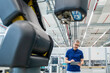 © Westend61 - Engineer using tablet in modern industrial factory with automation