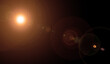 © grafcizu - Real anamorphic sun lens flare effect isolated on black background. Optical light leak with artistic bokeh circles and horizontal beam for photo composite, film overlay, and abstract background design
