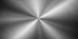 © RABBANU - A polished silver metallic plate featuring a brushed stainless steel texture and shiny light reflection on a gray aluminum surface pattern for a textured material backdrop design